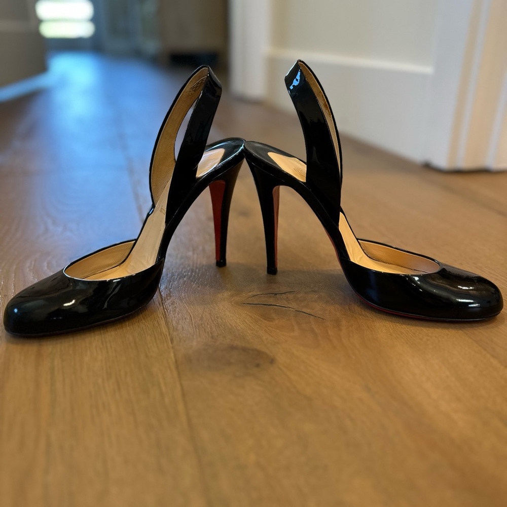 Black patent leather sling back Christian Louboutin pumps